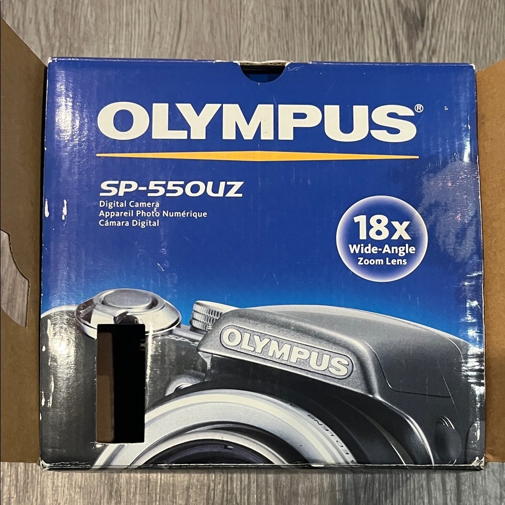Olympus SP-550UZ Camera with Blue Box